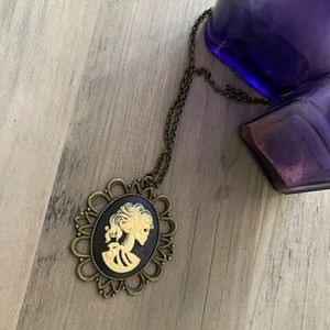 Skeleton cameo necklace